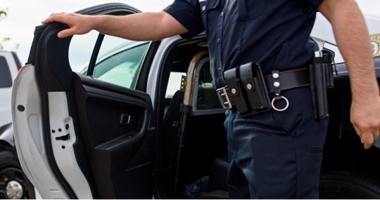police officer getting out of car